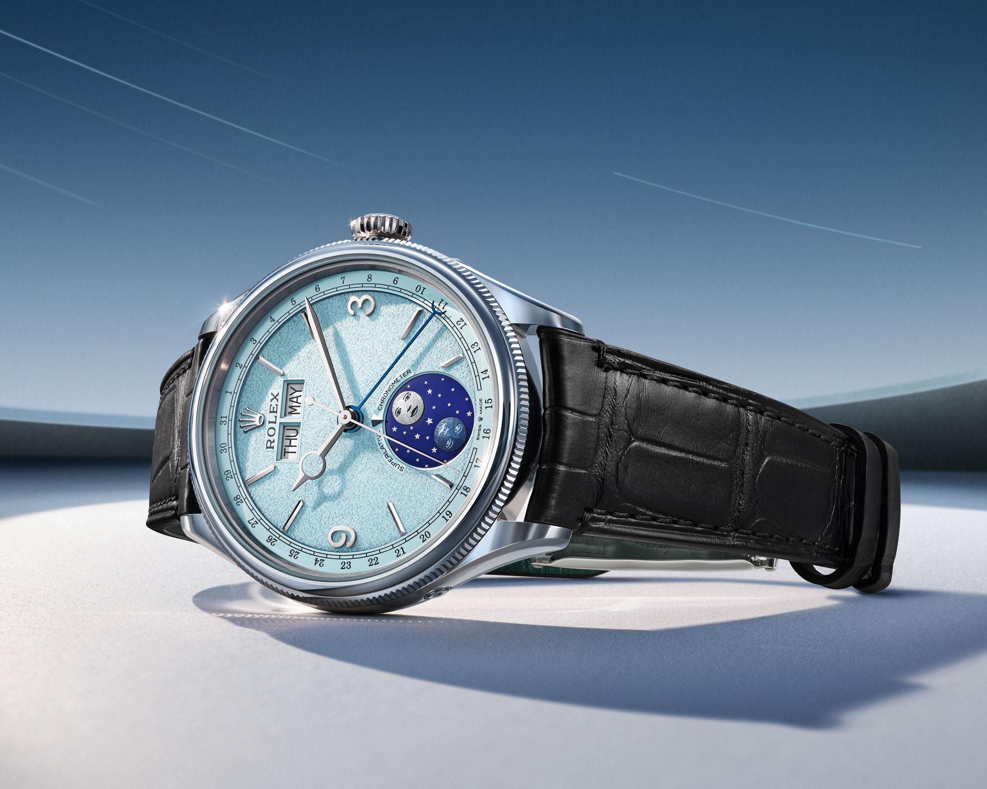Détail du cadran de la Rolex Perpetual Padellone montrant les guichets jour, date, mois et la phase de lune